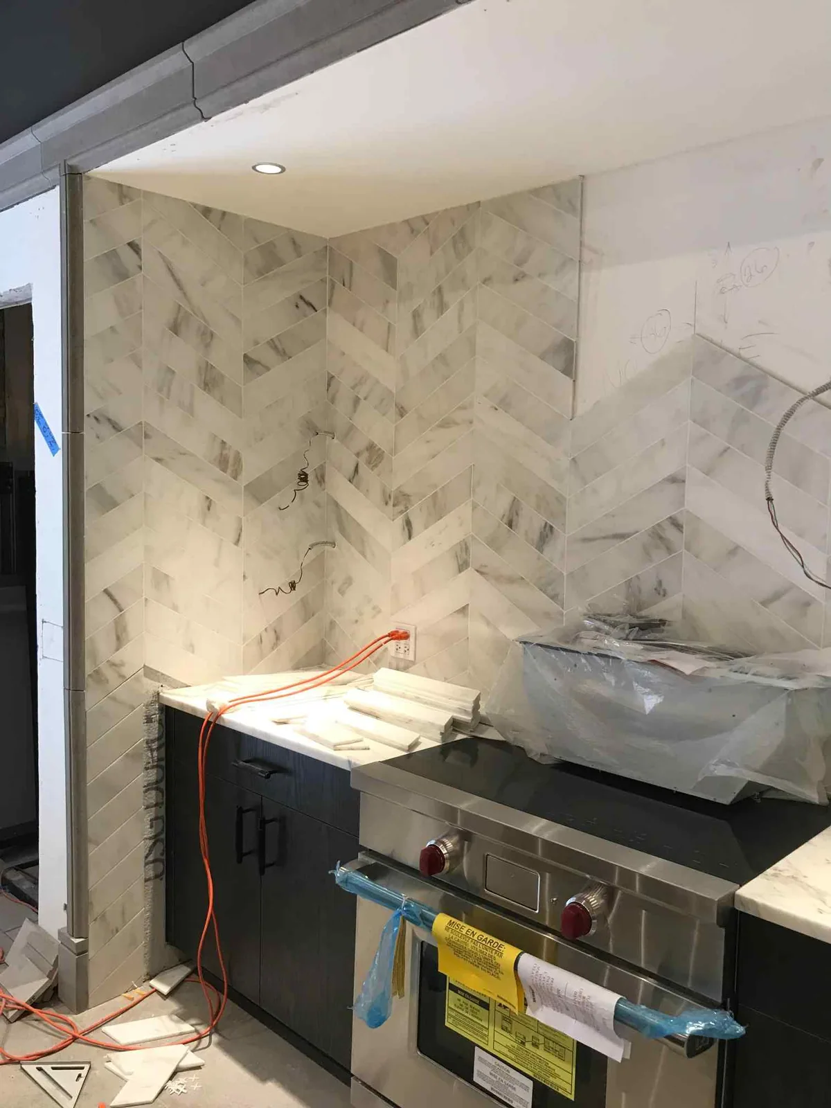 Tile backsplash installation in a Chicago kitchen